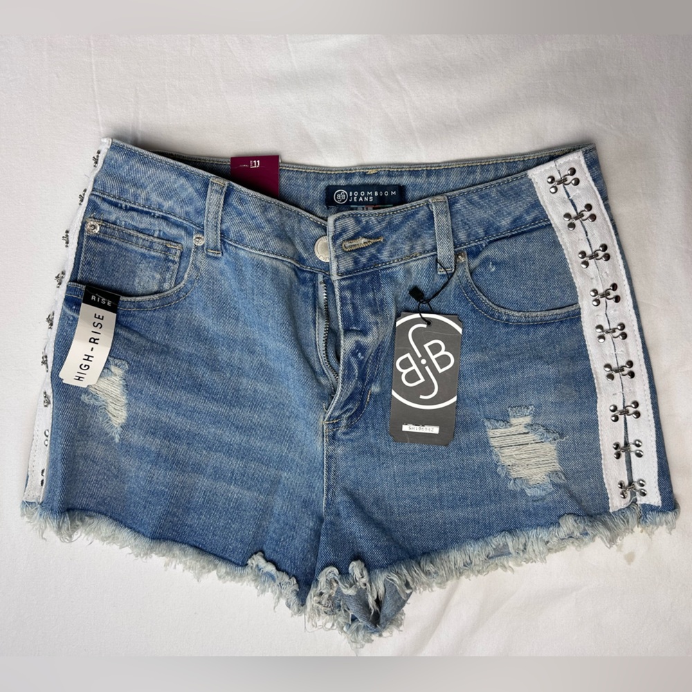 Never worn short frayed mini shorts with white stripe and side buckles